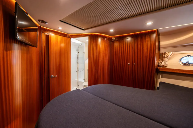 Slide: The Image of Luxurious interior of 2021 Nimbus 405 Coupé yacht with wood paneling and modern amenities. - 37