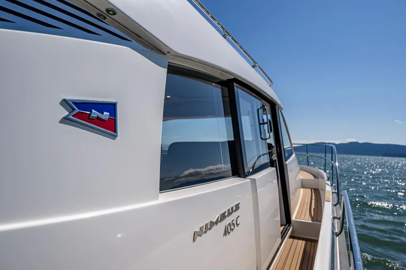 Slide: The Image of Nimbus 405 Coupé #88 yacht cruising on a sunny day, 2021 model. - 4