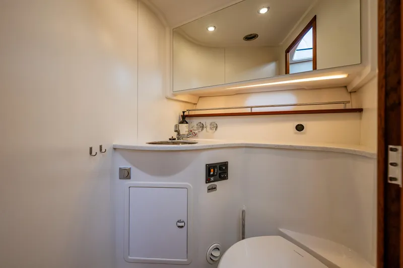 Slide: The Image of Modern bathroom interior in 2021 Nimbus 405 Coupé yacht, featuring sleek design and amenities. - 43