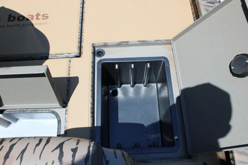 Slide: The Image of Open storage compartment on 2026 Xpress H18 boat deck. - 14