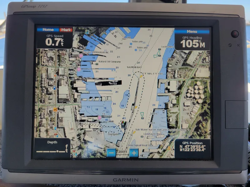 Slide: The Image of Garmin GPS display on 2001 SeaSport 2700 Navigator showing nautical map and navigation data. - 27
