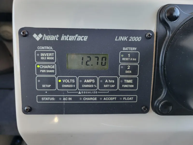 Slide: The Image of Heart Interface Link 2000 control panel displaying 12.7 volts on a SeaSport 2700 Navigator. - 31