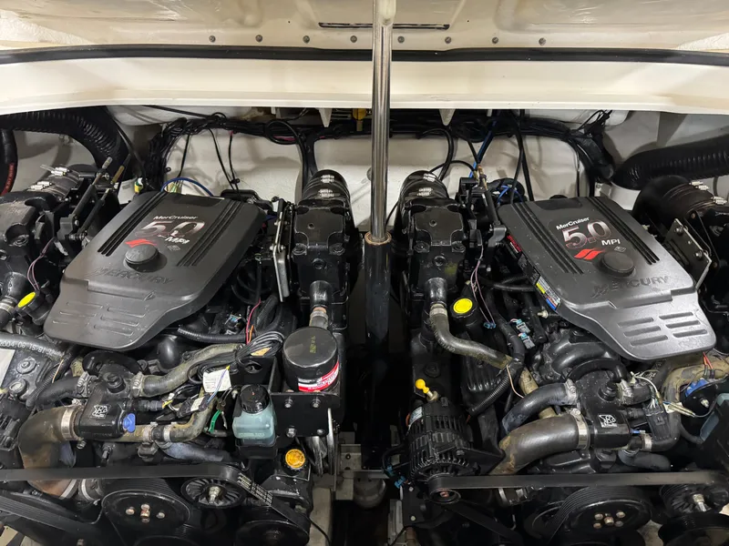 Slide: The Image of Twin MerCruiser engines in a 2005 Sea Ray 290 SLX boat. - 13