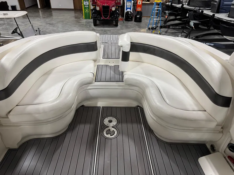 Slide: The Image of Luxurious seating area on a 2005 Sea Ray 290 SLX boat with sleek design. - 7