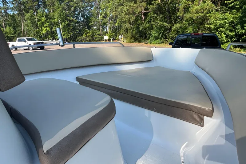 Slide: The Image of Interior view of a 2019 Key Largo 2000 boat with cushioned seating. - 4