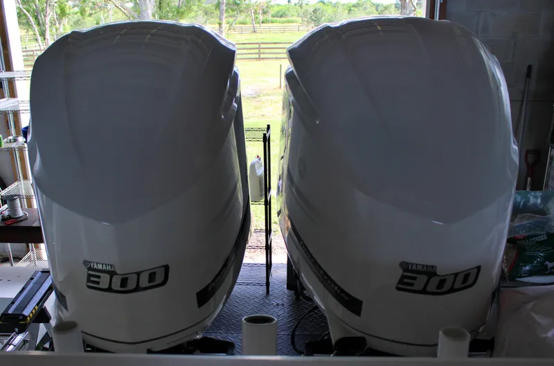 Slide: The Image of Twin Yamaha 300 outboard engines on a 2018 Jupiter 30 HFS boat. - 21