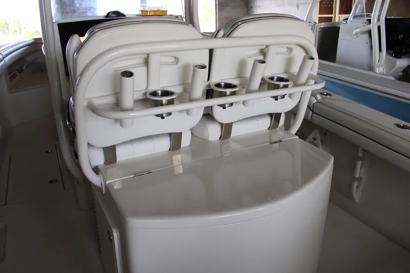 Slide: The Image of Interior of 2018 Jupiter 30 HFS boat featuring rod holders and seating. - 9