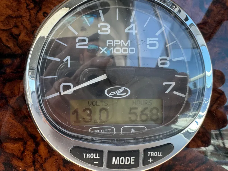 Slide: The Image of Close-up of 2005 Sea Ray 300 Sundancer tachometer showing 568 hours and 13.0 volts. - 8