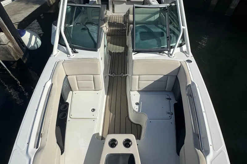 Slide: The Image of 2015 Boston Whaler 270 Vantage boat interior with seating and windshield. - 12