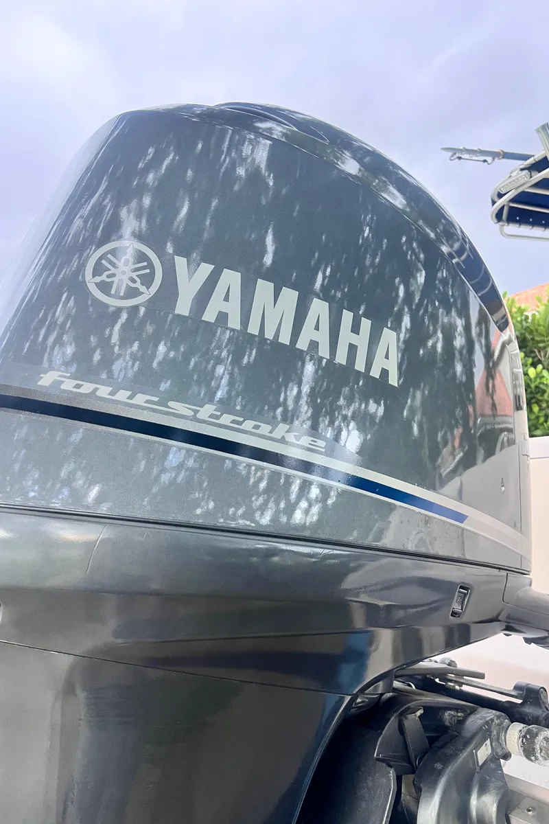 Slide: The Image of Yamaha four-stroke outboard motor on 2004 Grady-White 257 Advance CC boat. - 3