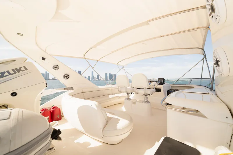 Slide: The Image of Luxurious 1999 Bayliner 5788 yacht interior with city skyline view. - 32