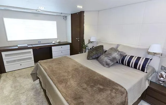 Slide: The Image of Luxurious bedroom interior in 2026 Schaefer 25M yacht, featuring elegant decor and plush bedding. - 11