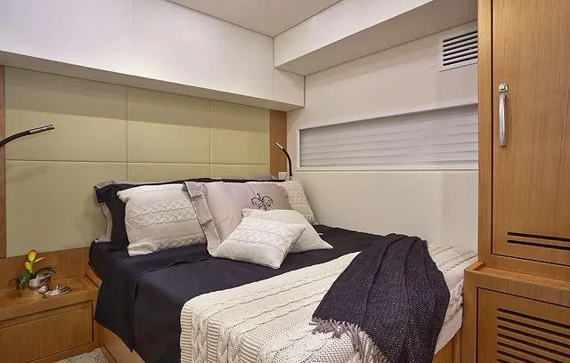 Slide: The Image of Luxurious cabin interior of 2026 Schaefer 25M yacht with cozy bedding and modern design. - 16