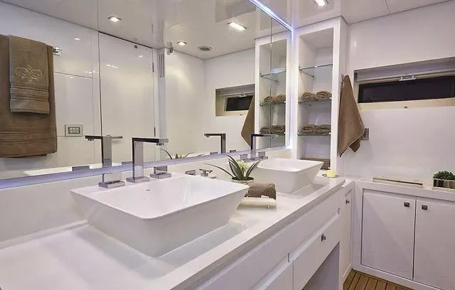 Slide: The Image of Luxurious bathroom in 2026 Schaefer 25M yacht with dual sinks and modern fixtures. - 17