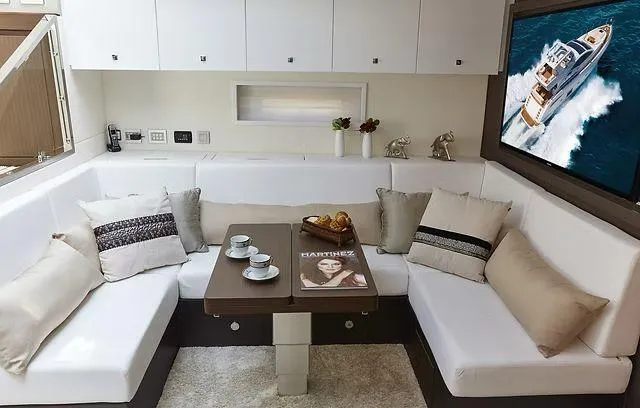 Slide: The Image of Luxurious Schaefer 25M yacht interior with cozy seating, elegant decor, and modern amenities, 2026 model. - 9