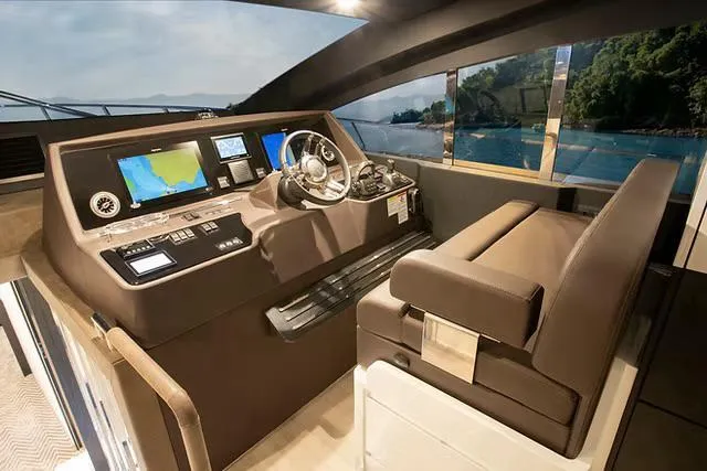 Slide: The Image of Luxurious Schaefer 770 yacht cockpit with modern navigation systems, 2026 model. - 13