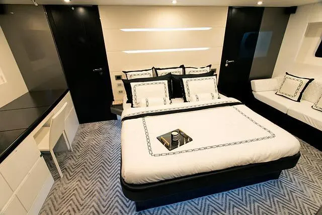 Slide: The Image of Luxurious Schaefer 770 yacht bedroom, 2026 model, featuring elegant bedding and modern decor. - 14