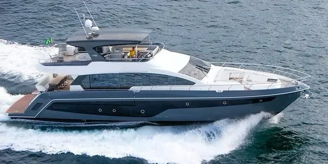 Slide: The Image of Luxury Schaefer 770 yacht cruising on open water, 2026 model. - 2