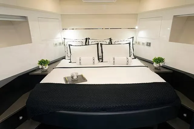 Slide: The Image of Luxurious bedroom interior of 2026 Schaefer 770 yacht with elegant bedding and decor. - 20
