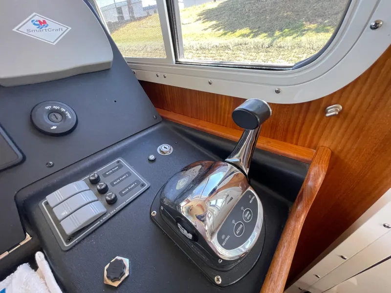 Slide: The Image of Control panel of a 2006 American Tug 34 with SmartCraft technology. - 19