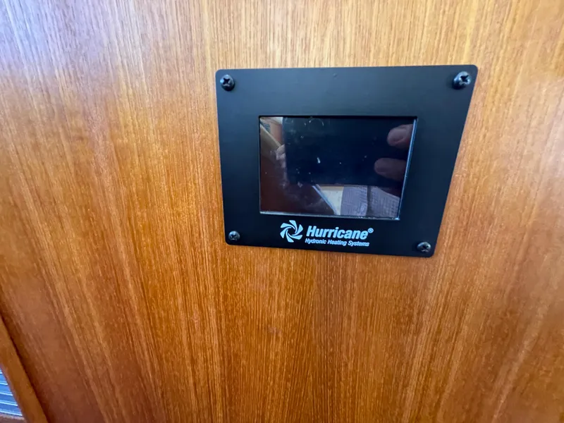 Slide: The Image of Hurricane hydronic heating system panel on 2006 American Tug 34 boat interior. - 28