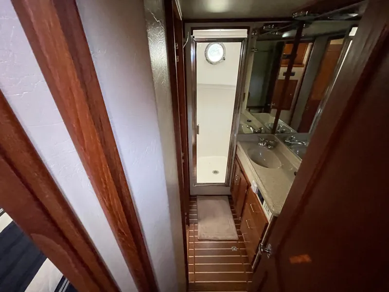 Slide: The Image of Bathroom interior of 2006 American Tug 34 with shower and sink. - 36