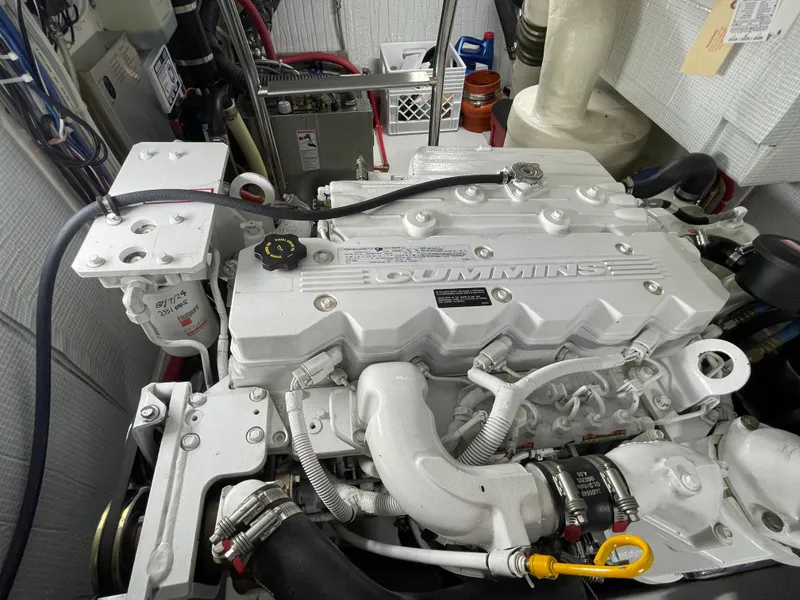 Slide: The Image of Engine compartment of a 2006 American Tug 34 with a Cummins engine. - 48