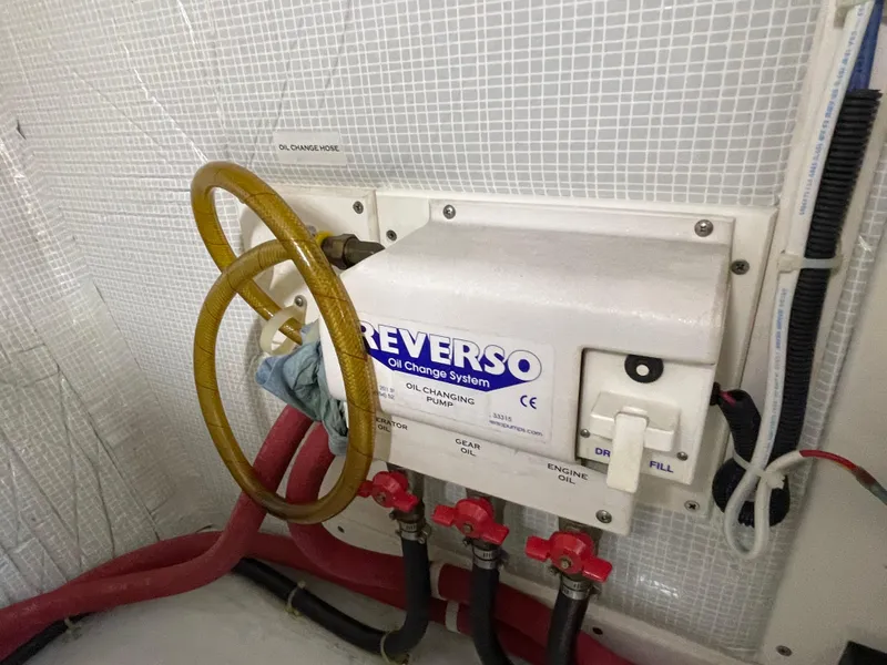 Slide: The Image of Reverso oil change system in 2006 American Tug 34 engine room. - 49