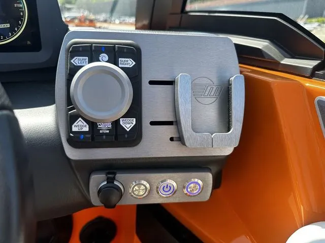 Slide: The Image of Control panel of 2023 Malibu 21 LX boat with surf and wedge settings. - 24