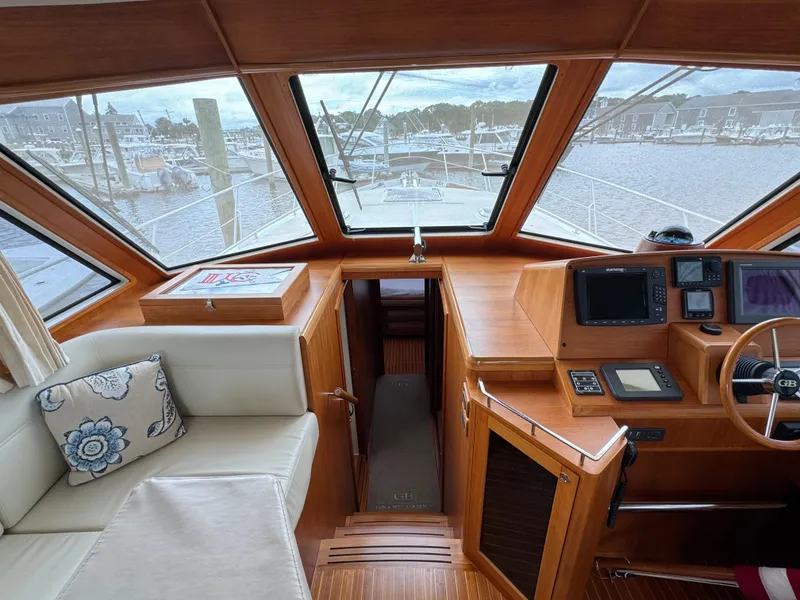 Slide: The Image of 2009 Grand Banks 45 Eastbay SX helm with panoramic windows and plush seating. - 29