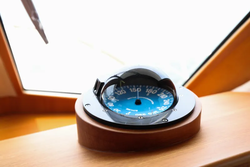 Slide: The Image of Compass on 2008 Grand Banks EASTBAY 39 SX yacht dashboard. - 15