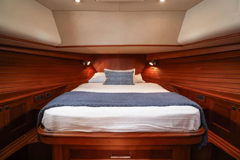 Slide: The Image of Luxurious cabin interior of 2008 Grand Banks EASTBAY 39 SX yacht with cozy bedding. - 25