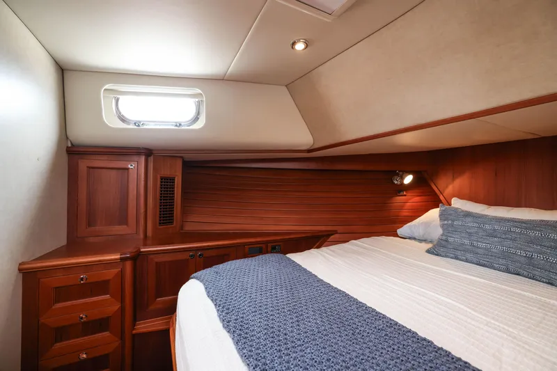 Slide: The Image of Luxurious cabin interior of 2008 Grand Banks EASTBAY 39 SX yacht with wood finish. - 28