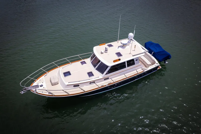 Slide: The Image of 2008 Grand Banks EASTBAY 39 SX yacht on calm water, aerial view. - 34