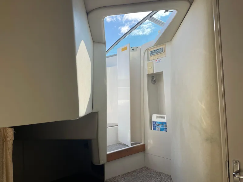 Slide: The Image of Interior view of 1998 Cruisers 2870 Rogue boat, showing cabin entrance and stairs. - 35