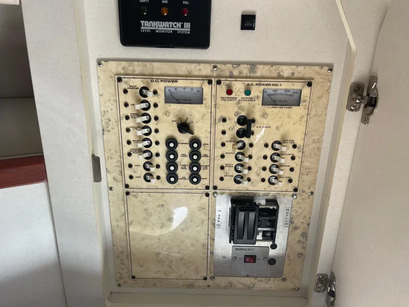 Slide: The Image of Electrical control panel on a 1998 Cruisers 2870 Rogue boat. - 36