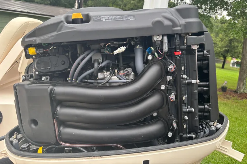 Slide: The Image of 2021 Grady-White 251 Coastal Explorer boat engine, detailed view of components. - 19