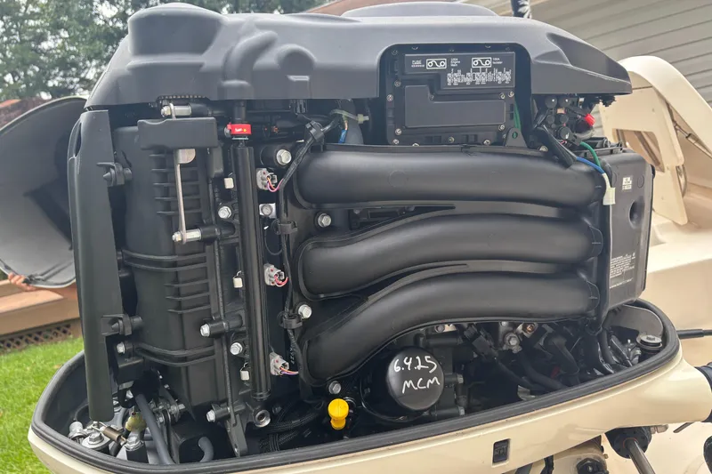 Slide: The Image of Close-up of a 2021 Grady-White 251 Coastal Explorer boat engine. - 20