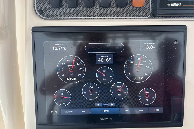Slide: The Image of Garmin display on 2021 Grady-White 251 Coastal Explorer showing engine metrics and GPS speed. - 36