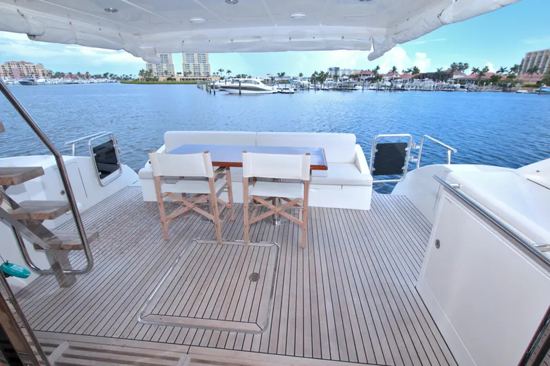 Slide: The Image of Luxury yacht deck with seating area, overlooking marina. Dyna 60, 2015 model. - 20