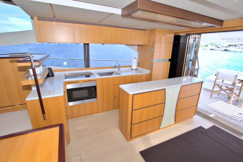 Slide: The Image of Luxurious kitchen interior on 2015 Dyna 60 yacht with ocean view. - 39