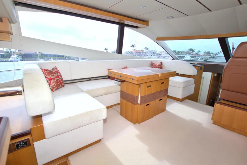 Slide: The Image of Luxurious interior of 2015 Dyna 60 yacht with elegant seating and wooden accents. - 43