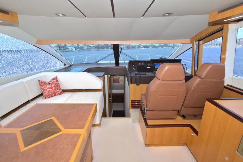 Slide: The Image of Luxurious interior of 2015 Dyna 60 yacht with leather seats and panoramic windows. - 45