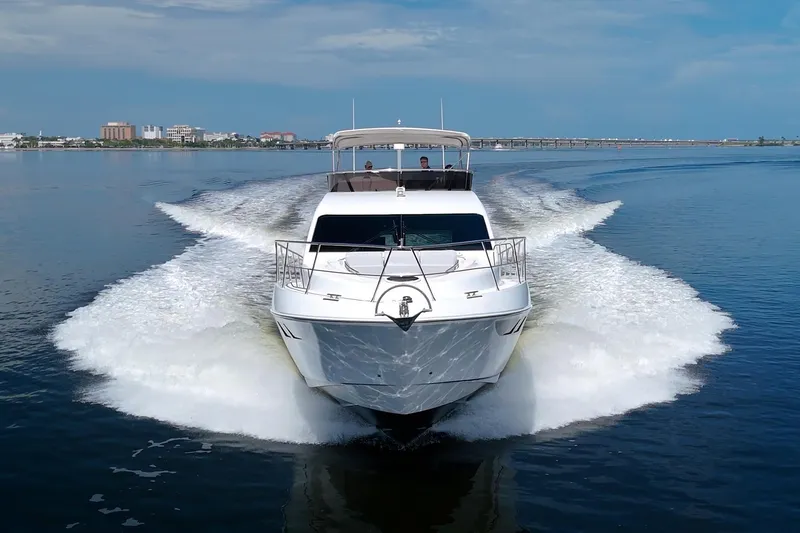 Slide: The Image of Luxury Dyna 60 yacht cruising on calm waters, 2015 model. - 5