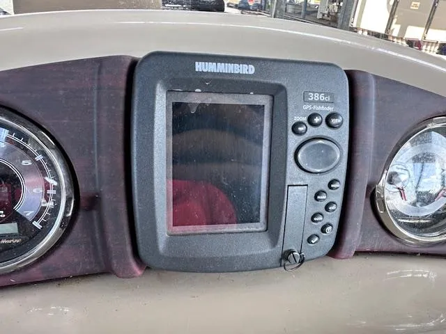 Slide: The Image of Dashboard of 2015 Xcursion X21F with Humminbird GPS fishfinder. - 28