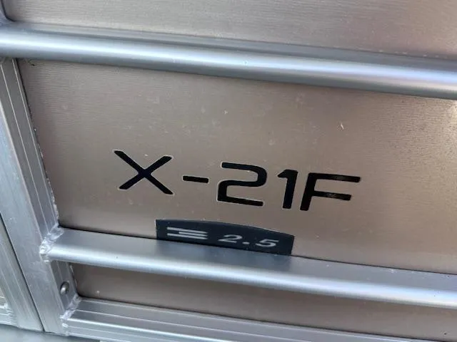 Slide: The Image of 2015 Xcursion X21F boat model detail with metallic finish. - 3
