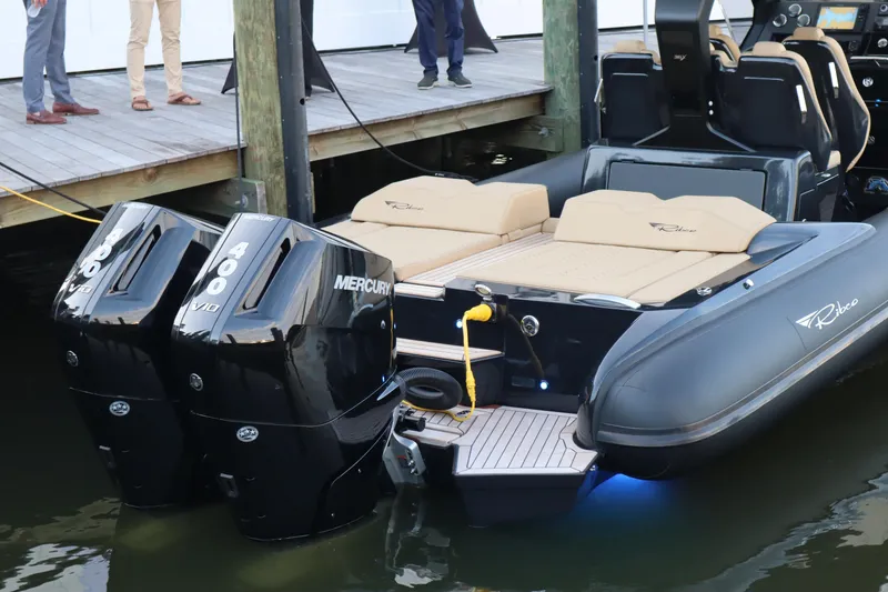 Slide: The Image of 2023 Ribco Seafarer 36 X boat with dual Mercury 400 engines docked. - 18