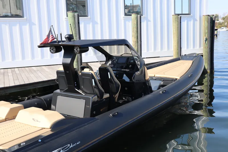 Slide: The Image of 2023 Ribco Seafarer 36 X boat docked, featuring sleek design and modern amenities. - 2