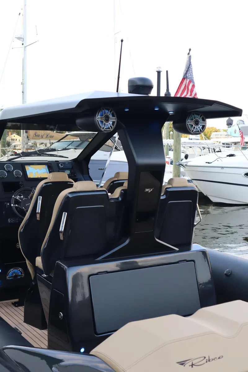 Slide: The Image of 2023 Ribco Seafarer 36 X luxury boat interior with modern seating and advanced navigation system. - 21