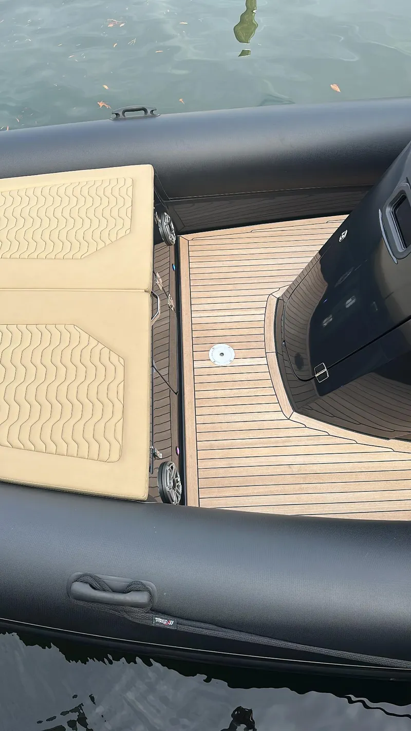 Slide: The Image of 2023 Ribco Seafarer 36 X boat with teak deck and cushioned seating. - 8